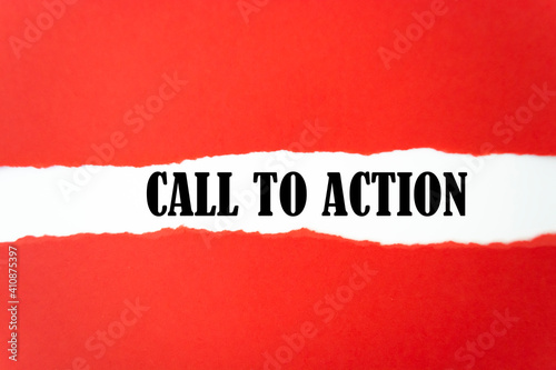 CALL TO ACTION appearing behind torn paper. Business