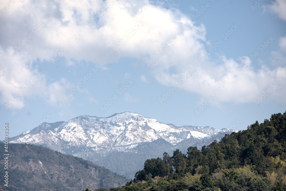 Fototapeta premium Snowfall on Mussoorie Himalayas above Dhanaulti range