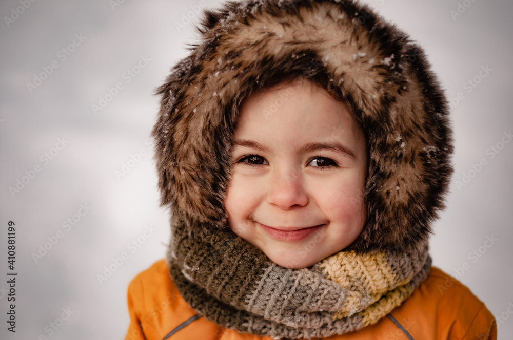 girl in yellow on the street in winter girl in yellow on the street in winter