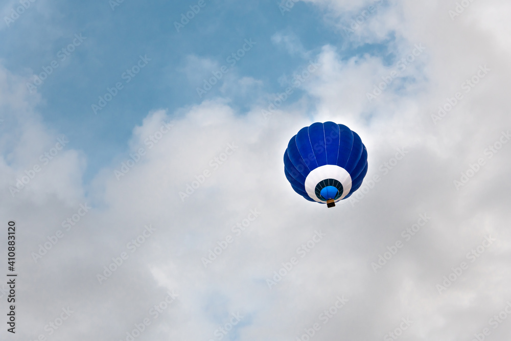 Fototapeta premium Hot air balloon over the blue sky over Igualada, Spain