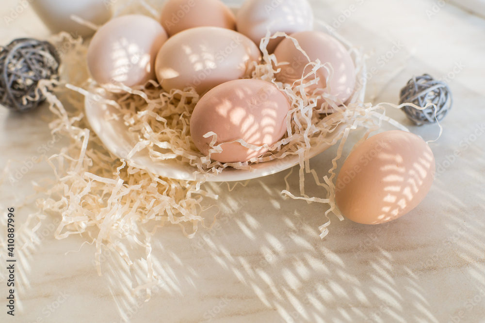 Natural easter eggs on table in the farm. Easter. Farm products. Eco-friendly products
Natural easter eggs on table in the farm. Easter. Farm products. Eco-friendly products