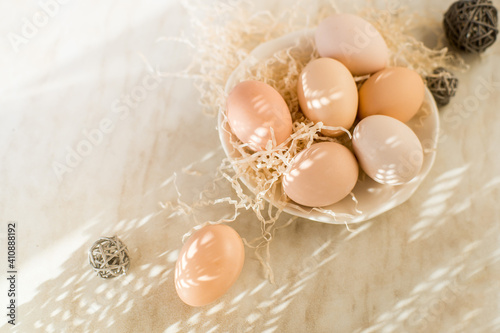 Natural easter eggs on table in the farm. Easter. Farm products. Eco-friendly products 