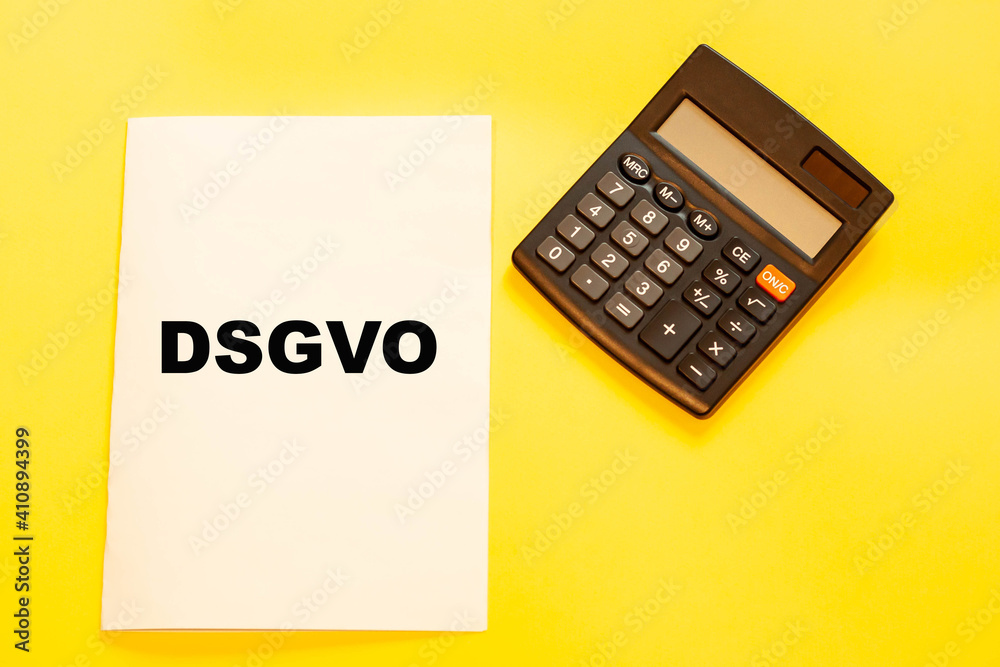 DSGVO - data protection regulations in German on a white sheet DSGVO - data protection regulations in German on a white sheet