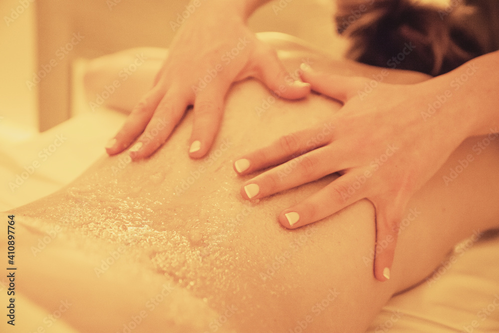 Fototapeta premium hands massage back of woman in spa and relaxation
