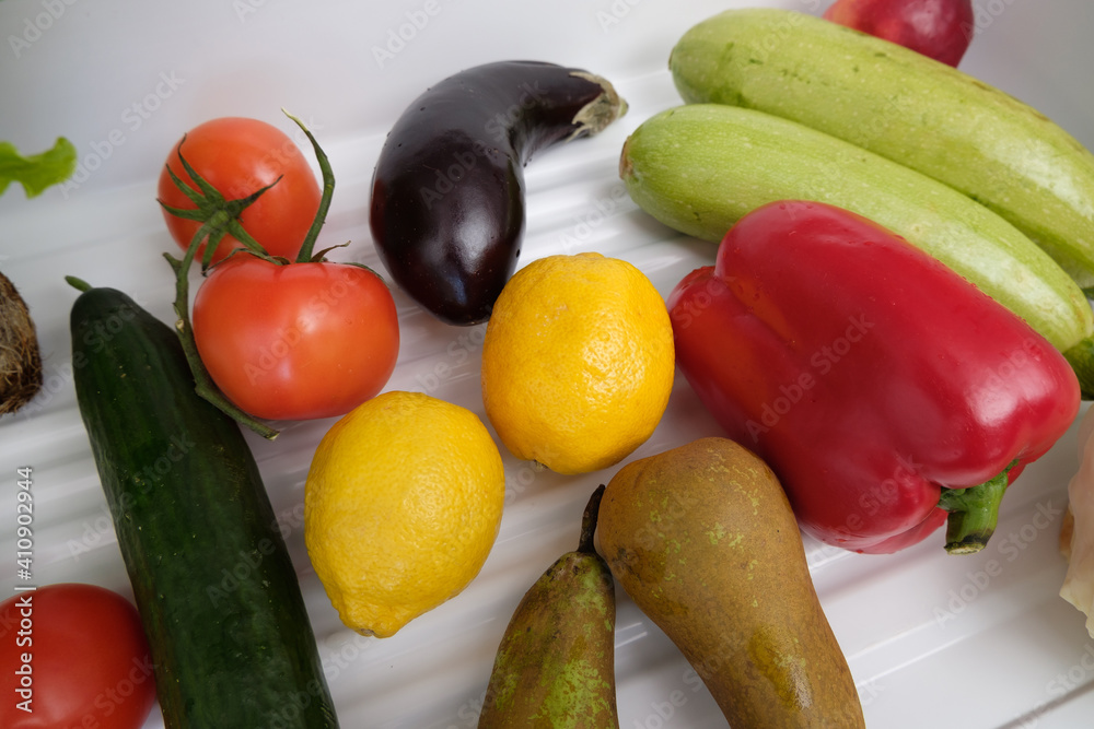 Frozen food in the refrigerator. Vegetables on the freezer shelves. Stocks of meal for the winter.. Frozen food in the refrigerator. Vegetables on the freezer shelves. Stocks of meal for the winter..