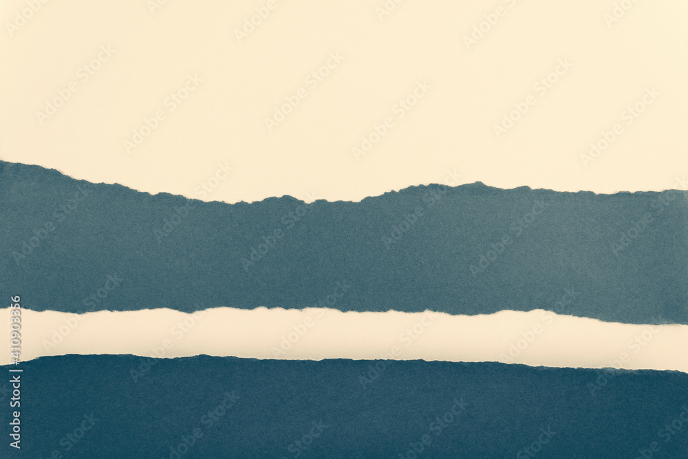 Ripped paper edge with copy space, blue and beige color background. Flat lay. Copy space. Ripped paper edge with copy space, blue and beige color background. Flat lay. Copy space.