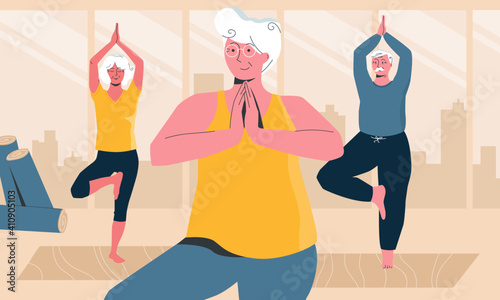 Senior people doing yoga in local yoga class