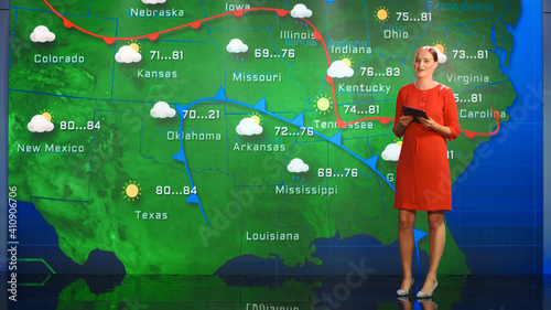 Live Weather News Studio with Professional Female On-Camera Meteorologist Standing Beside Screen and Making Gestures to Point at Weather Synoptic Map Chart for United States of America