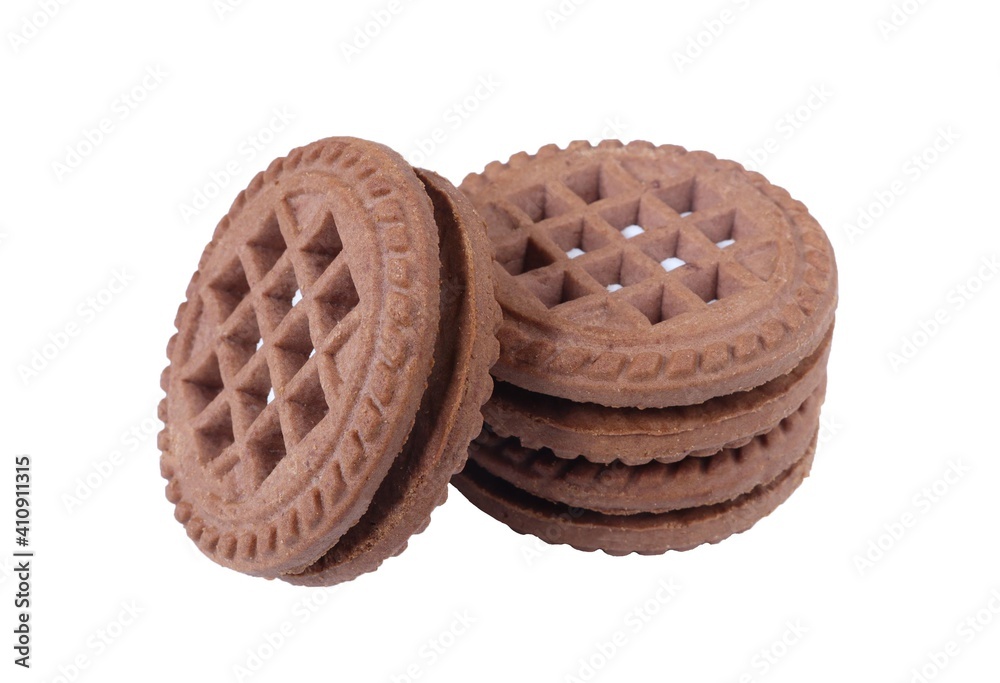 Brown chocolate round cookies in a stack isolated on white background Brown chocolate round cookies in a stack isolated on white background