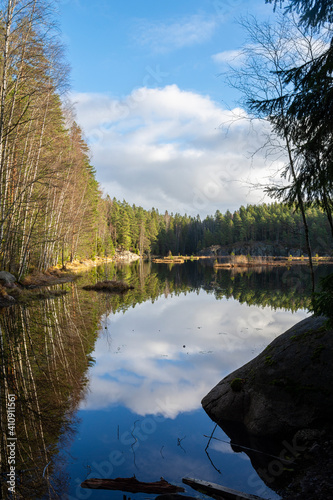 View of The Mustalampi Pond in autumn, Nuuksio National Park, Espoo, Finland photo