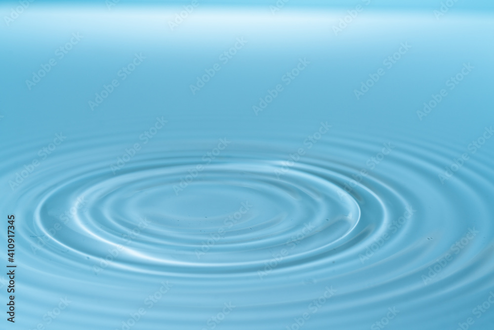 Drop of water drop to the surface. Waves on the surface of the water from a collision Drop of water drop to the surface. Waves on the surface of the water from a collision