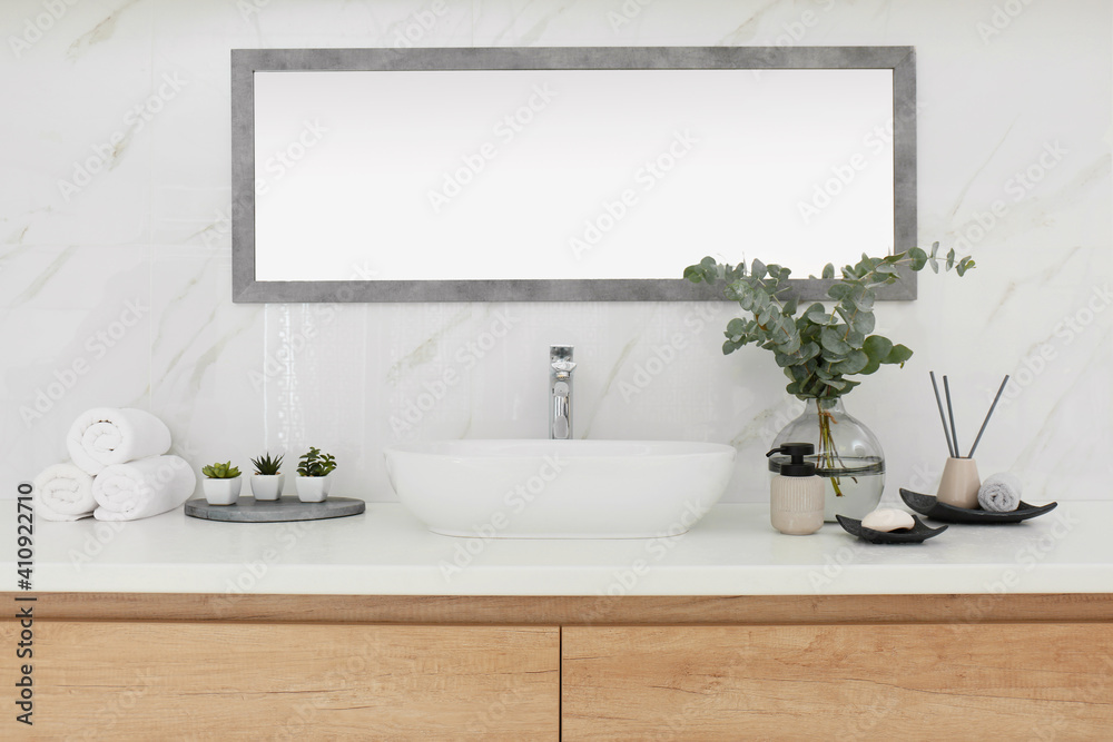 Modern bathroom interior with stylish mirror and vessel sink Modern bathroom interior with stylish mirror and vessel sink