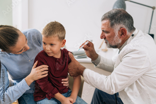 young boy with his mother visit pediatrician
