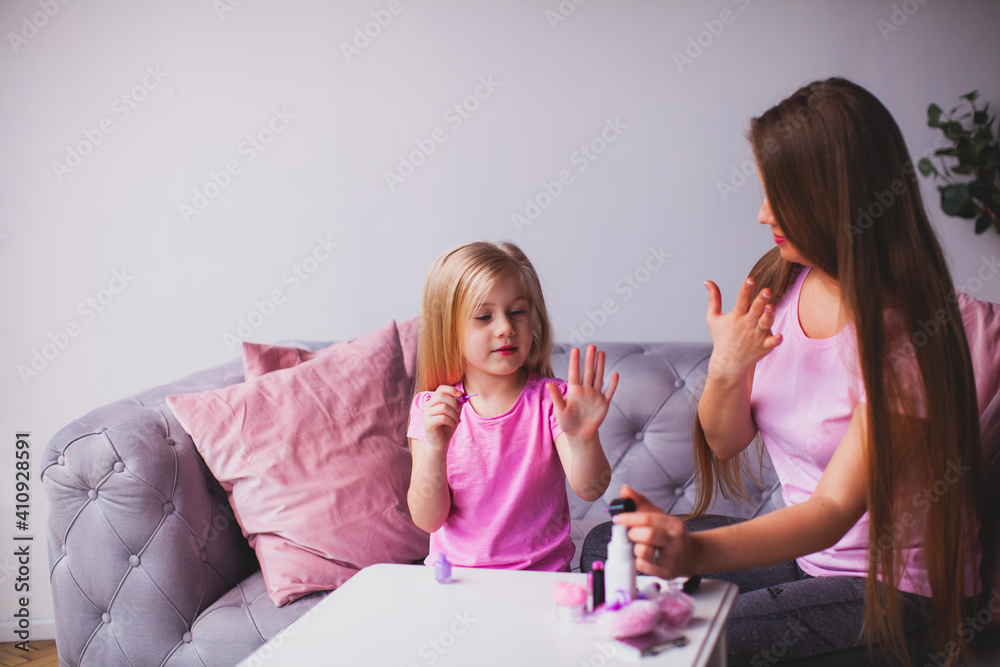 adult and little girls take care of their appearance adult and little girls take care of their appearance