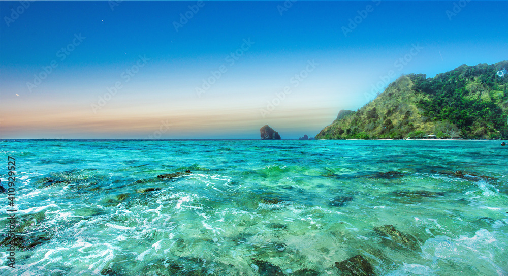 Clear water and blue sky. Sea beach in Krabi province Thailand.