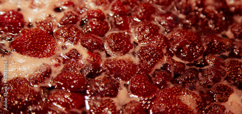 Strawberry jam is boiling, detailed shooting.