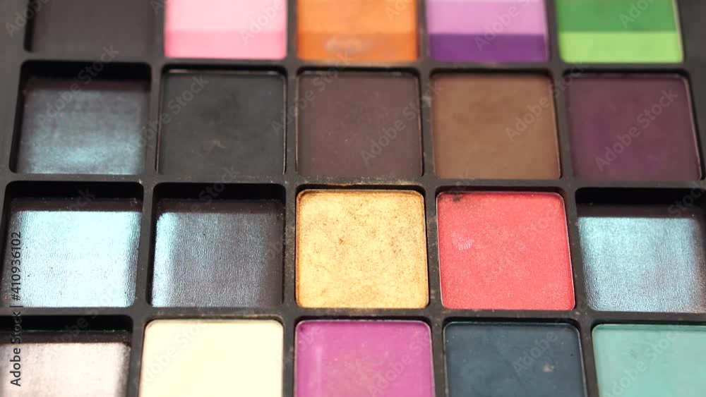 A tilt shot of girls makeup kit. A tilt shot of girls makeup kit.