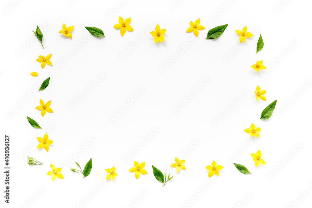 Frame of yellow flowers with leaves. Wreath of wild spring flowers