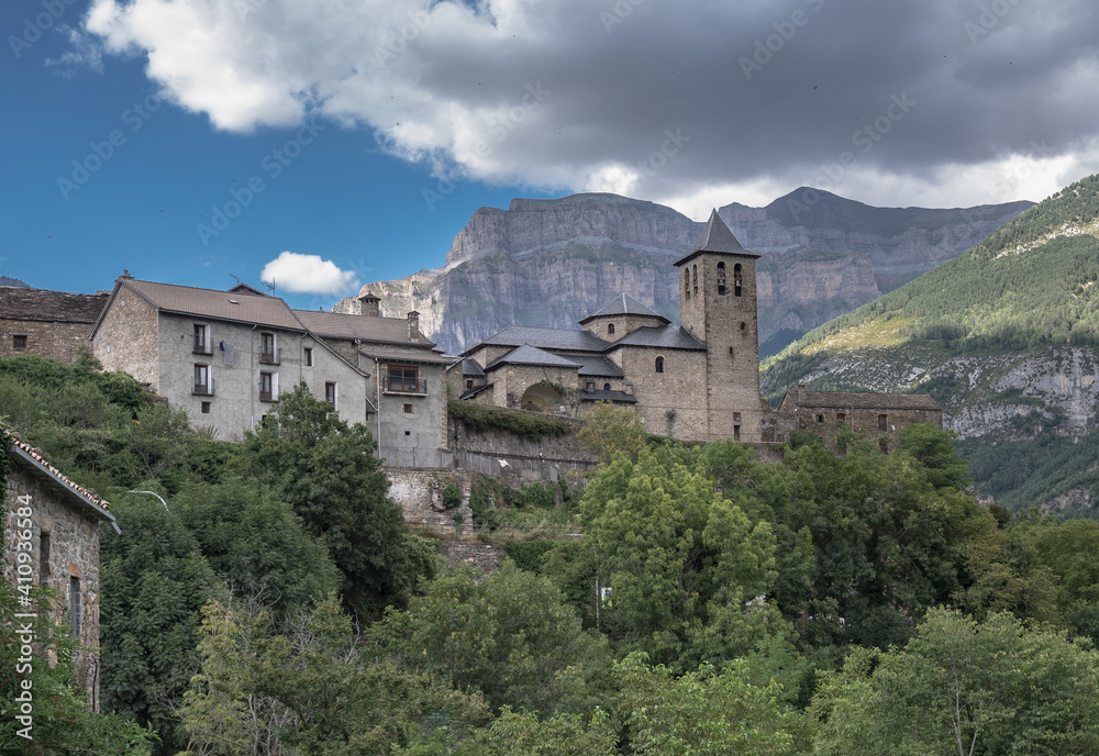 View of Torla-Ordesa village, located in a glacial valley of Ara river, the gateway to the Spanish Pyrenees, Ordesa and Monte Perdido National Park, Province of Huesca, Aragon, Spain.
