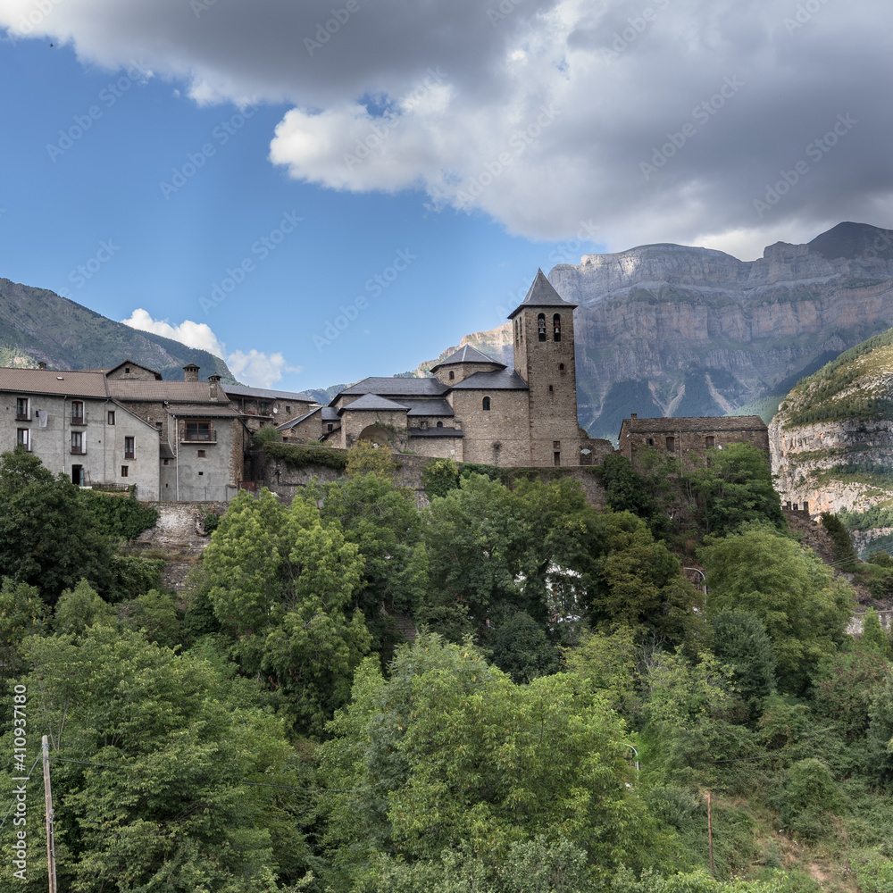 View of Torla-Ordesa village, located in a glacial valley of Ara river, the gateway to the Spanish Pyrenees, Ordesa and Monte Perdido National Park, Province of Huesca, Aragon, Spain.