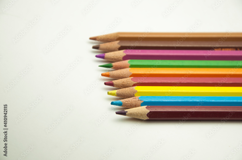 colored pencils on a white background. education concept. illustration of training. colored pencils on a white background. education concept. illustration of training.