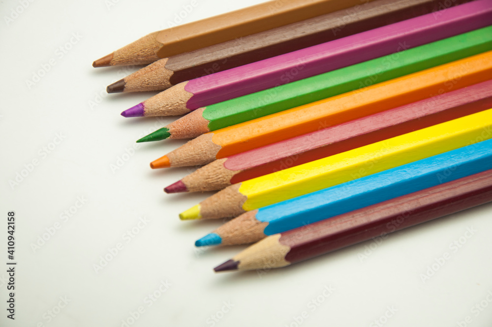 colored pencils on a white background. education concept. illustration of training. colored pencils on a white background. education concept. illustration of training.