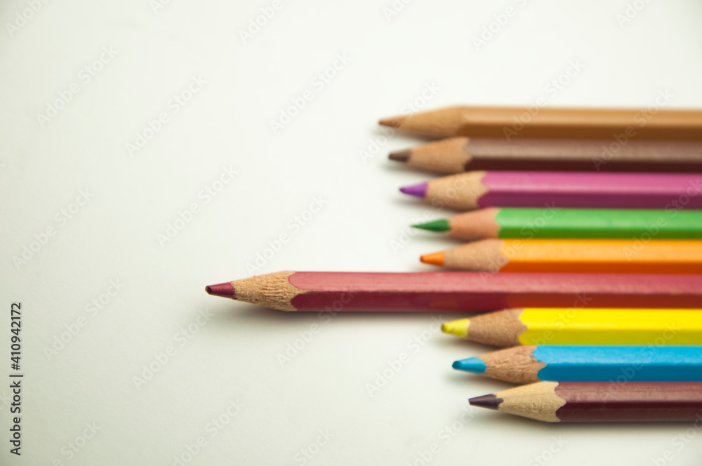 colored pencils on a white background. education concept. illustration of training. colored pencils on a white background. education concept. illustration of training.