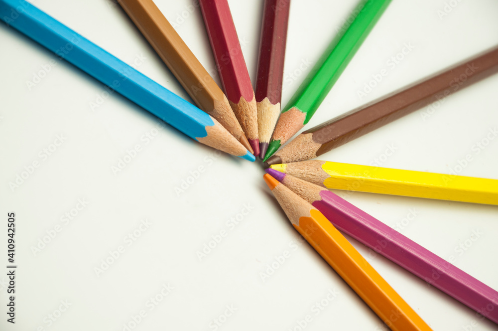 colored pencils on a white background. education concept. illustration of training. colored pencils on a white background. education concept. illustration of training.