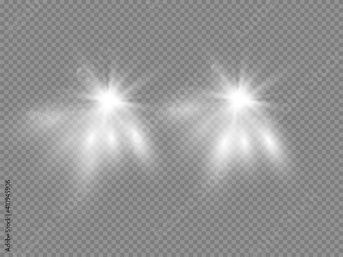 Cars headlight effect. Realistic yellow round flares beams isolated on transparent background. Vector bright car or train lights for your design.