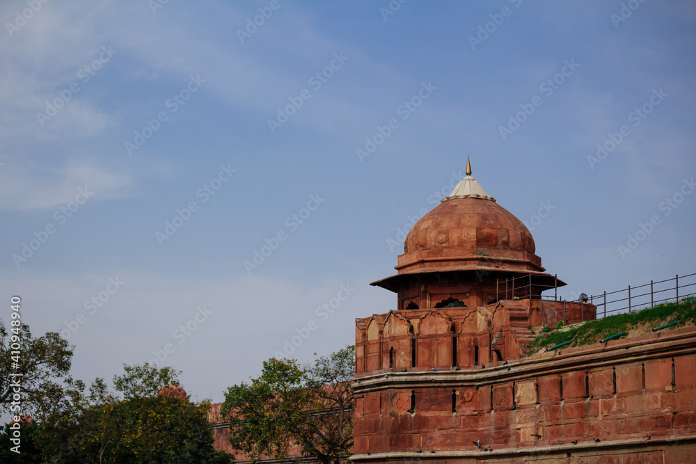 India travel tourism background - Red Fort (Lal Qila) Delhi - World Heritage Site. Inside view of the Red Fort, ancient tower of red stone in the fortress the dom