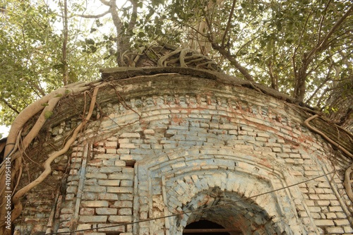 ruined spire of a neglected shiva temple at baro ras bari temple complex at chetla, kolkata photo