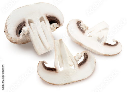 Sliced mushroom (champignon, cut foot, Agaricus Bisporus) and raw. Isolated on white background