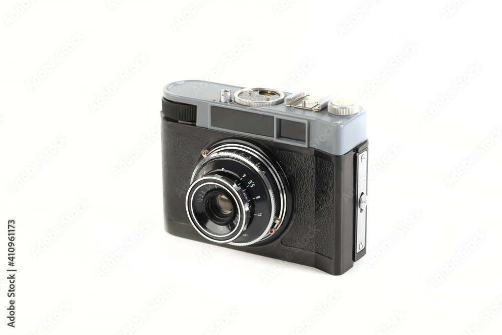 Old 35mm. scaling film camera on white background. Old 35mm. scaling film camera on white background.
