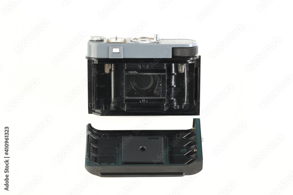 Old 35mm. scaling film camera on white background. Old 35mm. scaling film camera on white background.