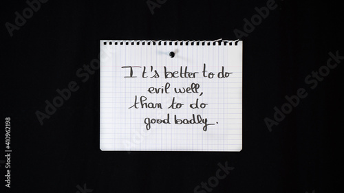 Hand written message on a ripped notebook sheet:  better to do evil well, that to do good badly