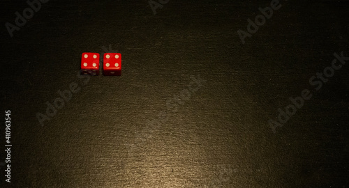 Dice combination on a black wooden surface