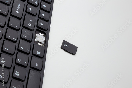 a broken ctrl button on white background photo