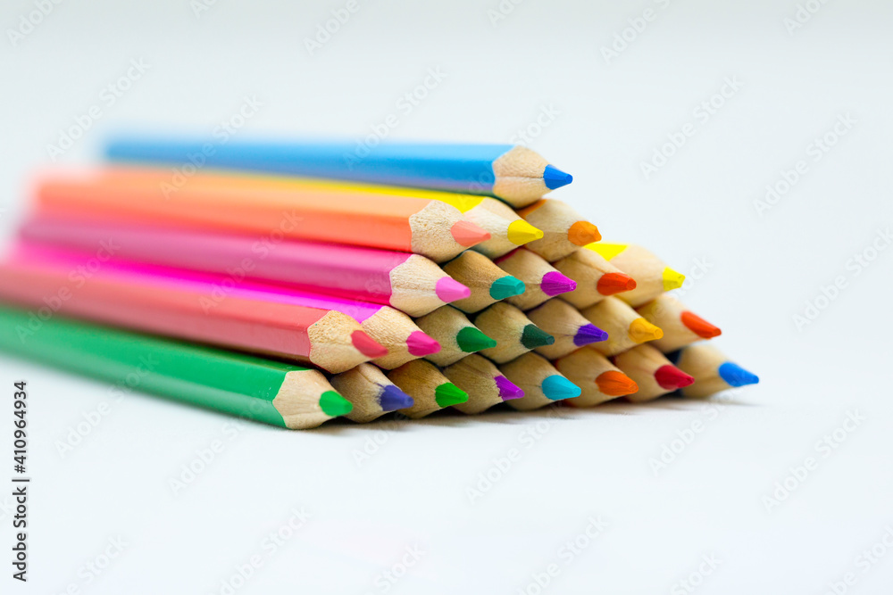Close-up shot of isolated coloring pencils with selective focus. Close-up shot of isolated coloring pencils with selective focus.
