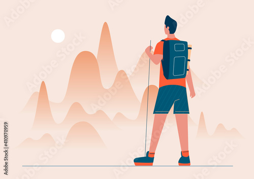 Tourist man looking on the mountain. Young and strong male character.