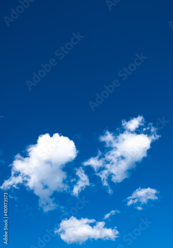blue sky with clouds portrait style on a beautiful summer day 