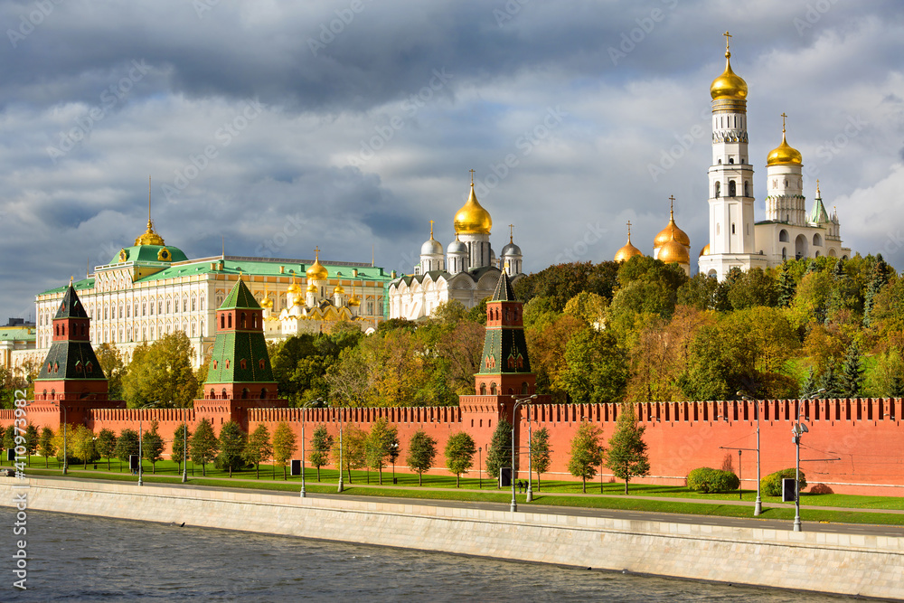 View of Kremlin Wall, Towers, Cathedrals and Grand Kremlin Palace from Kremlin Embankment side in center of Moscow, Russia