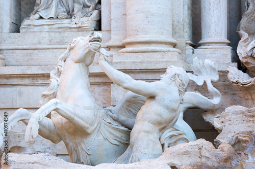 18th century Trevi Fountain, character of triton with a horse, Rome, Italy photo