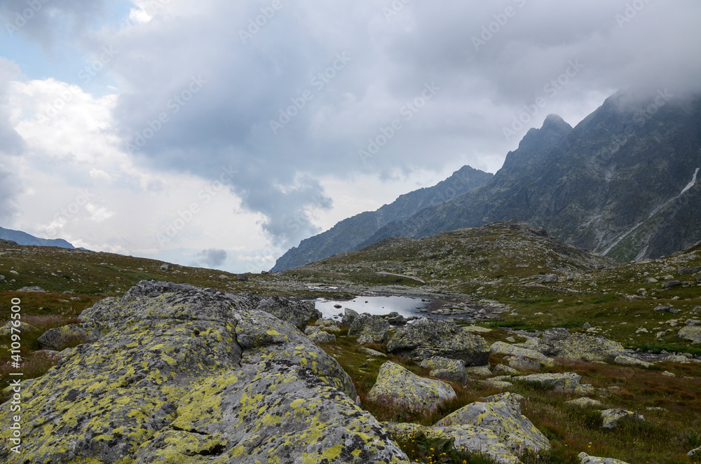 View of the Mengusovska valley in the mountains near the Hincovo pleso pond in the High Tatras. Slovakia. Hiking and travel destination