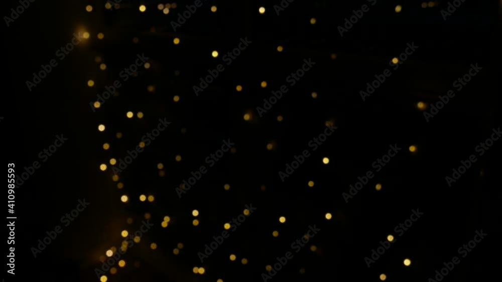 Beautiful blurred flickering yellow light. Home decoration with garlands on the window, night Bokeh lighting. Festive background. Beautiful blurred flickering yellow light. Home decoration with garlands on the window, night Bokeh lighting. Festive background.
