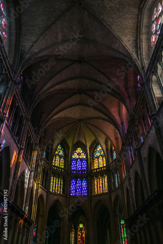 Inside the gothic St Cyr Ste Juliette Cathedral of Nevers, a city located in Burgundy, France. The stained glass windows are modern and were installed after WWII.