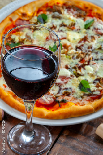 Dinner with wine and pizza