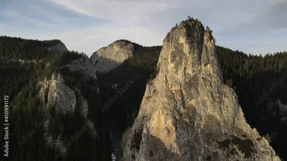 Big stone. of Cheile Bicazului with a cross above Big stone. of Cheile Bicazului with a cross above