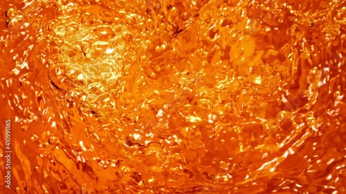 Super Slow Motion Shot of Golden Liquid Vortex at 1000 fps.