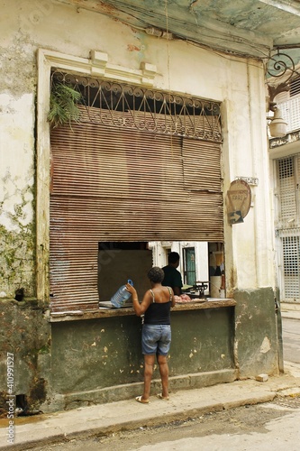 Photography An ordinary day in a butcher's shop in Havana