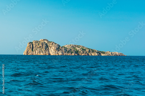 Island over the blue sea in Sardinia